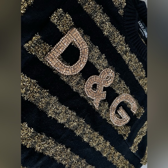 DOLCE&GABBANA
Cashmere blends
Black and gold sweater - Picture 5 of 13